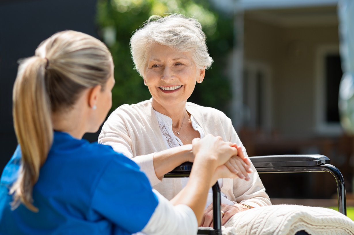 Nurse Takes Care of Old Patient